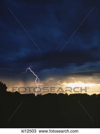 lightning bolt in dark stormy sky View Large Photo Image Stock Image - lightning bolt in dark stormy sky. Fotosearch