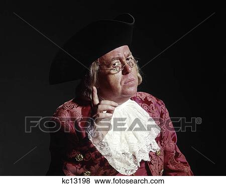 man 18th century colonial costume ben franklin giving advice warning gesture wear glasses tricorn hat View Large Photo Image Stock Photo - man 18th century colonial costume ben franklin giving advice warning gesture wear glasses tricorn hat. Fotosearch
