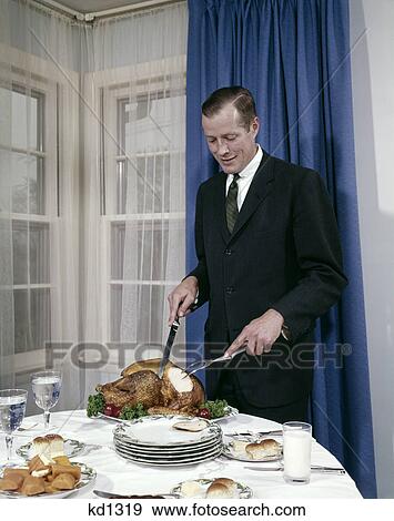 man carving turkey View Large Photo Image Stock Photo - man carving turkey. Fotosearch