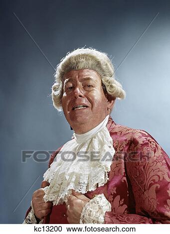 Stock Image - man wear 18th century colonial costume wig periwig talking speaking expression. Fotosearch