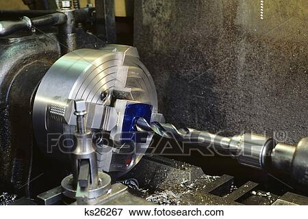 Stock Photo - metal lathe machine cutting abrading tool. Fotosearch