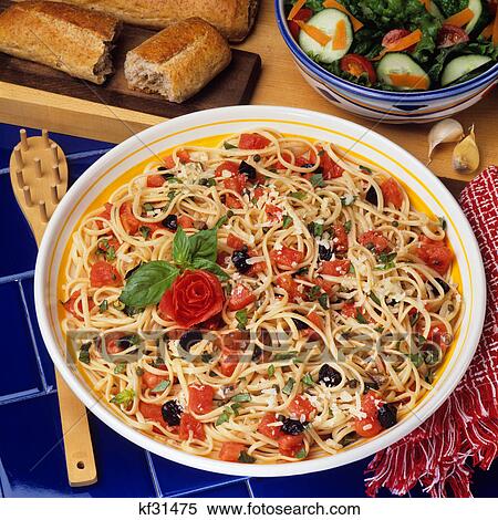 pasta with olives, tomatoes and basil View Large Photo Image Stock Photography - pasta with olives, tomatoes and basil. Fotosearch