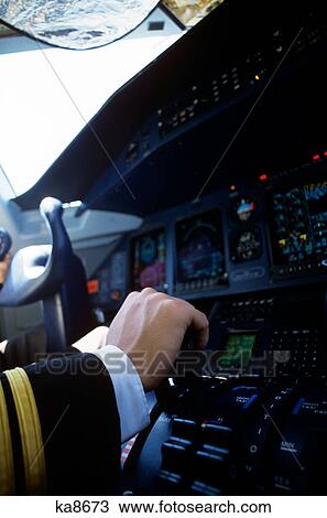 pilots hand on control of do-328 airplane in cockpit View Large Photo Image Stock Image - pilots hand on control of do-328 airplane in cockpit. Fotosearch