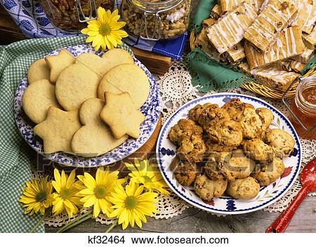 plates of cookies sugar raisin-walnut and frosted-raisin bars View Large Photo Image Picture - plates of cookies sugar raisin-walnut and frosted-raisin bars. Fotosearch