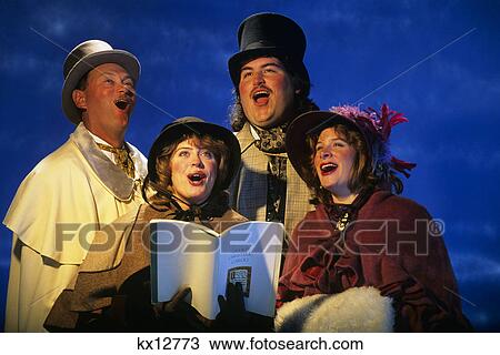 portrait of four christmas carolers in period costumes View Large Photo Image Stock Image - portrait of four christmas carolers in period costumes. Fotosearch