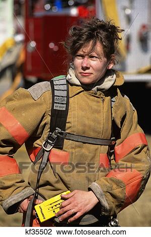 serious portrait working woman firefighter View Large Photo Image Stock Image - serious portrait working woman firefighter. Fotosearch