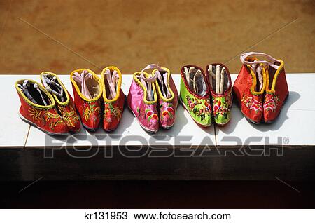 shoes for women with bound feet liuyi yunnan province china View Large Photo Image Stock Image - shoes for women with bound feet liuyi yunnan province china. Fotosearch