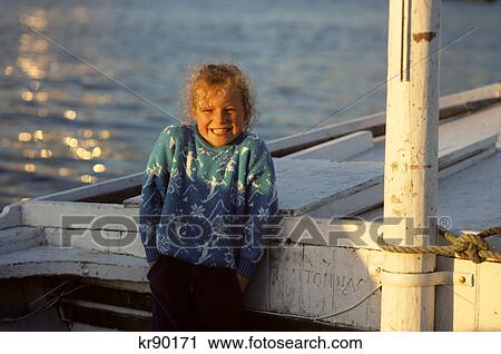 smiling irish girl aboard fishing boat county donegal, ireland View Large Photo Image Stock Image - smiling irish girl aboard fishing boat county donegal, ireland. Fotosearch
