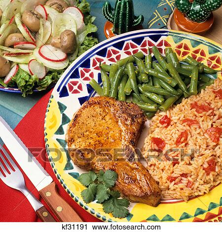 south of the border pork chop, mexican rice, beans and salad View Large Photo Image Stock Image - south of the border pork chop, mexican rice, beans and salad. Fotosearch