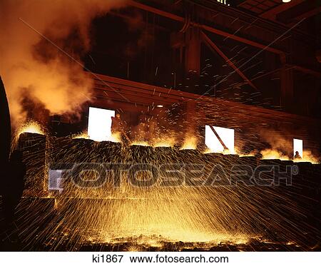 sparks of molten metal in steel mill alan wood steel company conshohocken pa View Large Photo Image Stock Photo - sparks of molten metal in steel mill alan wood steel company conshohocken pa. Fotosearch