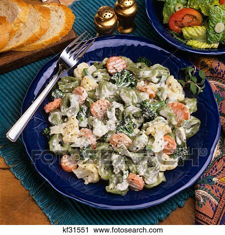 spinach tortellini with vegetables in cream sauce View Large Photo Image Stock Image - spinach tortellini with vegetables in cream sauce. Fotosearch