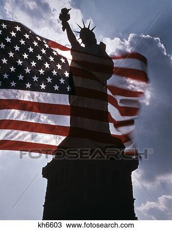 statue of liberty new york silhouetted against american flag and clouds View Large Photo Image Stock Image - statue of liberty new york silhouetted against american flag and clouds. Fotosearch