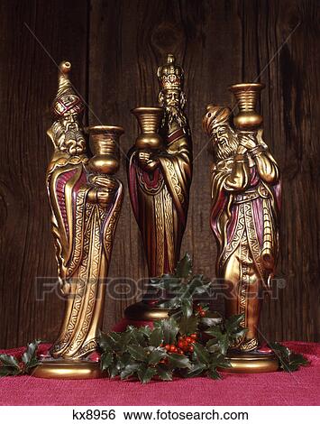 statues of the three wise men kings magi and a sprig of holly View Large Photo Image Stock Photograph - statues of the three wise men kings magi and a sprig of holly. Fotosearch
