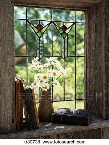 still life books bible spectacles vase of daisies sill of antique stained glass window View Large Photo Image Stock Photo - still life books bible spectacles vase of daisies sill of antique stained glass window. Fotosearch