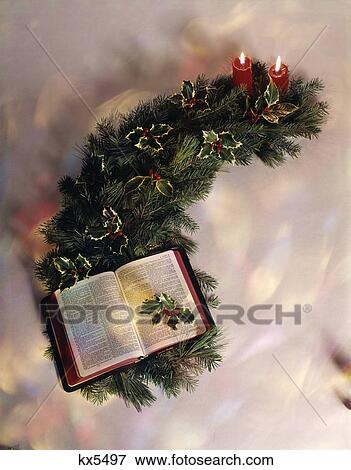 still life open bible candles christmas holly garland View Large Photo Image Stock Photo - still life open bible candles christmas holly garland. Fotosearch