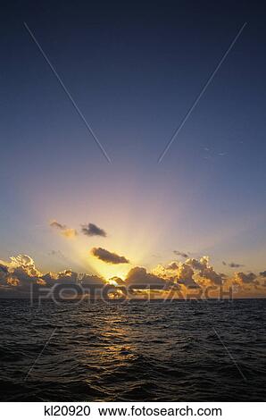 Stock Image - sunset over ocean st. john, virgin islands. Fotosearch