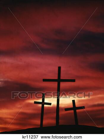symbolic three crosses of calvary silhouetted against red sky View Large Photo Image Stock Photo - symbolic three crosses of calvary silhouetted against red sky. Fotosearch