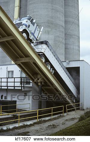tractor trailer truck unloading grain into elevator View Large Photo Image Stock Photo - tractor trailer truck unloading grain into elevator. Fotosearch
