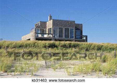 Stock Image - vacation house on beach. Fotosearch