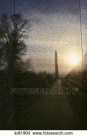 Picture - vietnam veterans memorial washington monument reflected in the wall washington, dc. Fotosearch