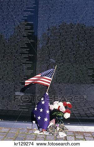 washington dc us flag and flowers at vietnam war memorial View Large Photo Image Picture - washington dc us flag and flowers at vietnam war memorial. Fotosearch