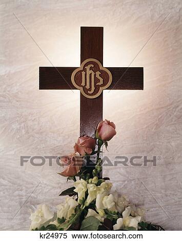 wooden cross with letters ihs and white snapdragon flowers pink roses at the base View Large Photo Image Stock Photography - wooden cross with letters ihs and white snapdragon flowers pink roses at the base. Fotosearch