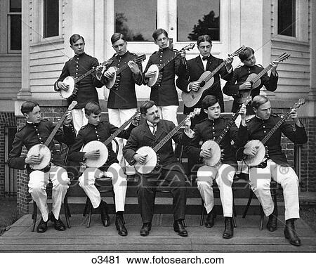 1890S 1900S Group Young Men Playing Banjos And Guitars In String Orchestra View Large Photo Image Stock Image - 1890S 1900S Group Young Men Playing Banjos And Guitars In String Orchestra. Fotosearch
