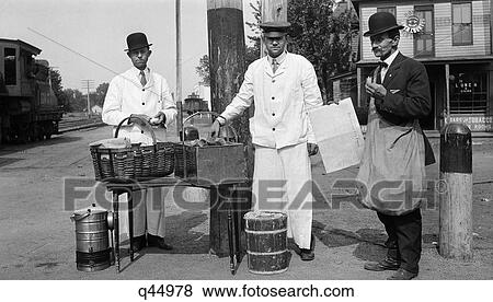 1910S Trio Of Men In Uniform Hot Dog Ice Cream & Newspaper Vendors View Large Photo Image Stock Photo - 1910S Trio Of Men In Uniform Hot Dog Ice Cream & Newspaper Vendors. Fotosearch