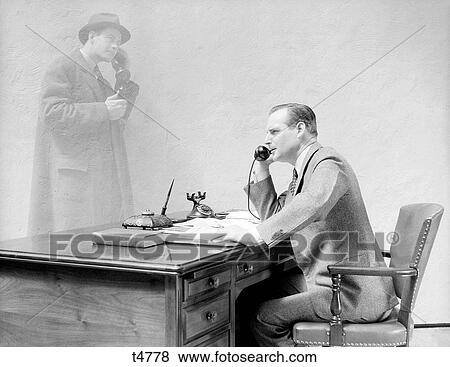 Stock Photo - 1930S 1940S Businessman At Desk Talking On Telephone To Salesman Client Ghost Graphic Effect Double Exposure Communication . Fotosearch