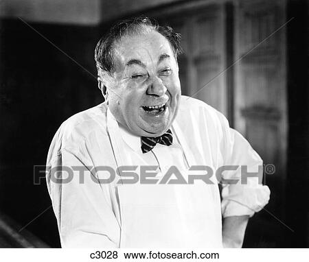 1930S 1940S Laughing Man Portrait Wearing Apron Butcher Baker Grocery Clerk Service Happy Man View Large Photo Image Stock Photo - 1930S 1940S Laughing Man Portrait Wearing Apron Butcher Baker Grocery Clerk Service Happy Man. Fotosearch