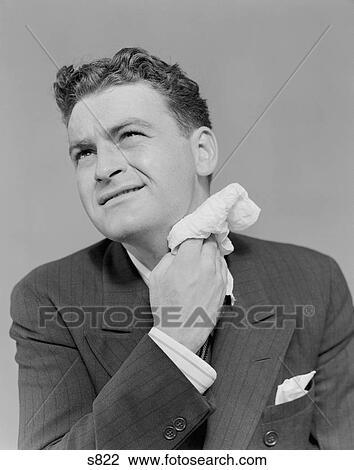 1930S 1940S Man Uncomfortable Grimace Sweating Wiping Neck With Handkerchief View Large Photo Image Stock Image - 1930S 1940S Man Uncomfortable Grimace Sweating Wiping Neck With Handkerchief. Fotosearch