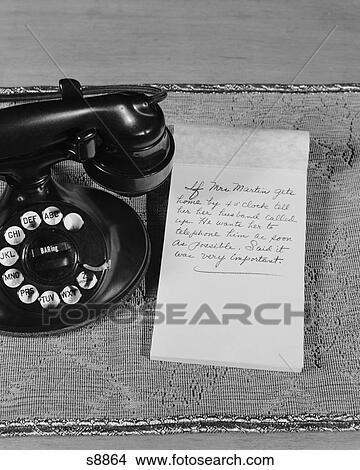 1930S 1940S Rotary Telephone Note Pad With Phone Message View Large Photo Image Picture - 1930S 1940S Rotary Telephone Note Pad With Phone Message. Fotosearch