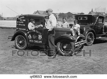 Stock Image - 1930S A & B Anheuser Busch Ice Cream Delivery Truck Boys & Man Buying Ice Cream From Vendor. Fotosearch