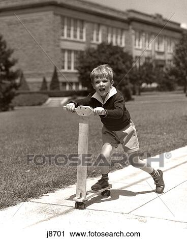 1930S Boy Outside On Scooter Having Fun View Large Photo Image Stock Image - 1930S Boy Outside On Scooter Having Fun. Fotosearch