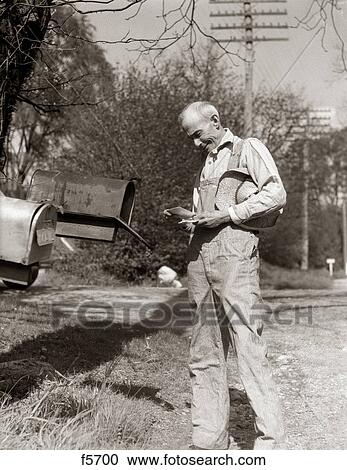 1930S Elderly Farmer Checking Mail Mailbox View Large Photo Image Stock Image - 1930S Elderly Farmer Checking Mail Mailbox. Fotosearch