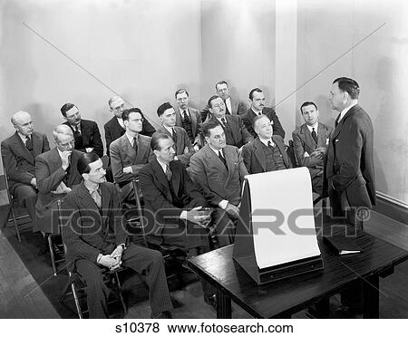 1930S Group Of Businessmen In Training Meeting Listening To Speaker View Large Photo Image Stock Photo - 1930S Group Of Businessmen In Training Meeting Listening To Speaker. Fotosearch