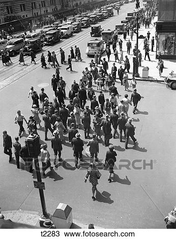 1930S Nyc Pedestrian Crowd Crossing Intersection Of 42Nd Street & 5Th Avenue Cars And Taxies Stop Light Hustle & Bustle View Large Photo Image Stock Image - 1930S Nyc Pedestrian Crowd Crossing Intersection Of 42Nd Street & 5Th Avenue Cars And Taxies Stop Light Hustle & Bustle. Fotosearch