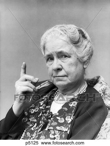 1930S Portrait Of Elderly Woman With Finger Raised At Viewer View Large Photo Image Stock Photography - 1930S Portrait Of Elderly Woman With Finger Raised At Viewer. Fotosearch