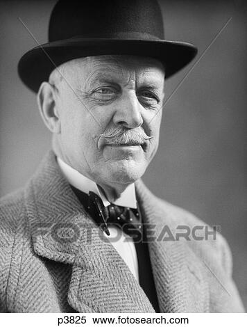 1930S Portrait Of Older Man With A Mustache Wearing A Bowler Hat And Bow Tie View Large Photo Image Stock Photography - 1930S Portrait Of Older Man With A Mustache Wearing A Bowler Hat And Bow Tie. Fotosearch