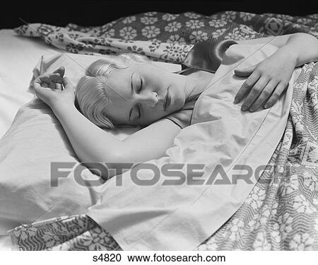 1930S Sleeping Blond Woman Hand Over Head Asleep View Large Photo Image Stock Image - 1930S Sleeping Blond Woman Hand Over Head Asleep. Fotosearch