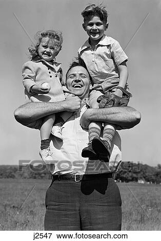 1930S Smiling Father Holding Son With Baseball Mitt & Daughter On His Shoulders View Large Photo Image Stock Photo - 1930S Smiling Father Holding Son With Baseball Mitt & Daughter On His Shoulders. Fotosearch