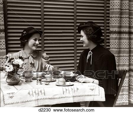 1930S Two Smiling Women Dining In Restaurant View Large Photo Image Stock Image - 1930S Two Smiling Women Dining In Restaurant. Fotosearch
