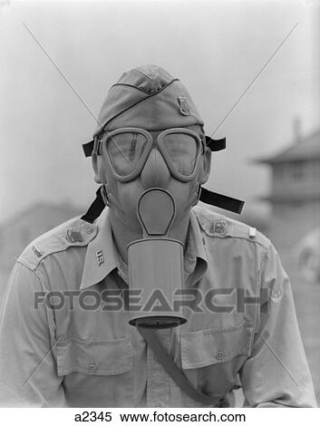 1940S 1942 Man Soldier Army Lieutenant Wearing A Gas Mask View Large Photo Image Stock Photography - 1940S 1942 Man Soldier Army Lieutenant Wearing A Gas Mask. Fotosearch