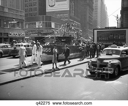1940S 1942 Miniature Destroyer Acts As A Navy Recruiting Station In Times Square New York City View Large Photo Image Stock Photography - 1940S 1942 Miniature Destroyer Acts As A Navy Recruiting Station In Times Square New York City. Fotosearch
