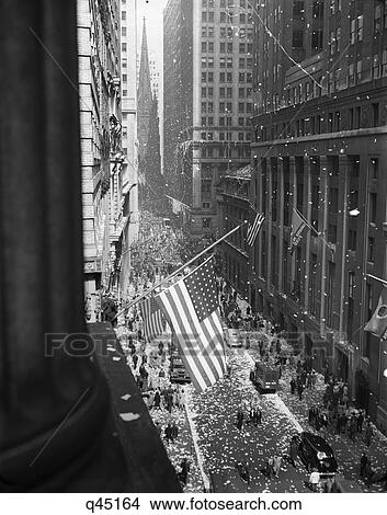 1940S 1945 Aerial View Of Ve Day Celebration On Wall Street Nyc With Flags And Confetti Flying View Large Photo Image Picture - 1940S 1945 Aerial View Of Ve Day Celebration On Wall Street Nyc With Flags And Confetti Flying. Fotosearch