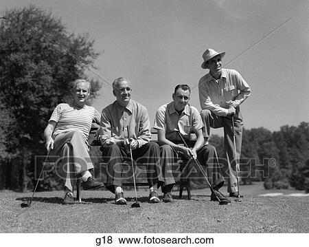 1940S 1950S Foursome Of Men Playing Golf Sitting Waiting To Tee-Off View Large Photo Image Stock Photo - 1940S 1950S Foursome Of Men Playing Golf Sitting Waiting To Tee-Off. Fotosearch