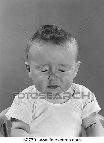 1940S 1950S Portrait Baby With Eyes Tightly Closed View Large Photo Image Stock Photo - 1940S 1950S Portrait Baby With Eyes Tightly Closed. Fotosearch