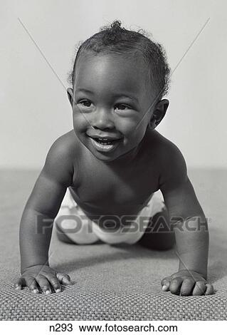 1940S 1950S Smiling African-American Baby Crawling View Large Photo Image Stock Image - 1940S 1950S Smiling African-American Baby Crawling. Fotosearch