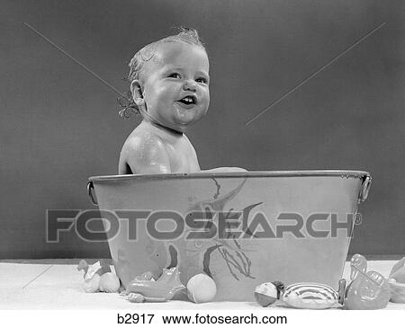 1940S 1950S Smiling Baby In Bath Tub Studio Indoor View Large Photo Image Stock Photo - 1940S 1950S Smiling Baby In Bath Tub Studio Indoor. Fotosearch