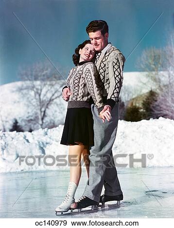 1940S 1950S Smiling Couple Ice Skating Wearing Matching Sweaters View Large Photo Image Stock Photo - 1940S 1950S Smiling Couple Ice Skating Wearing Matching Sweaters. Fotosearch